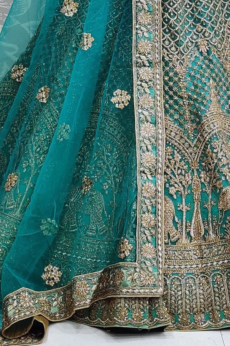 Firozi Shaded Colour Handloom Silk Lehenga Choli With Peach Colour Net  Dupatta - Nakkashi - 3226659