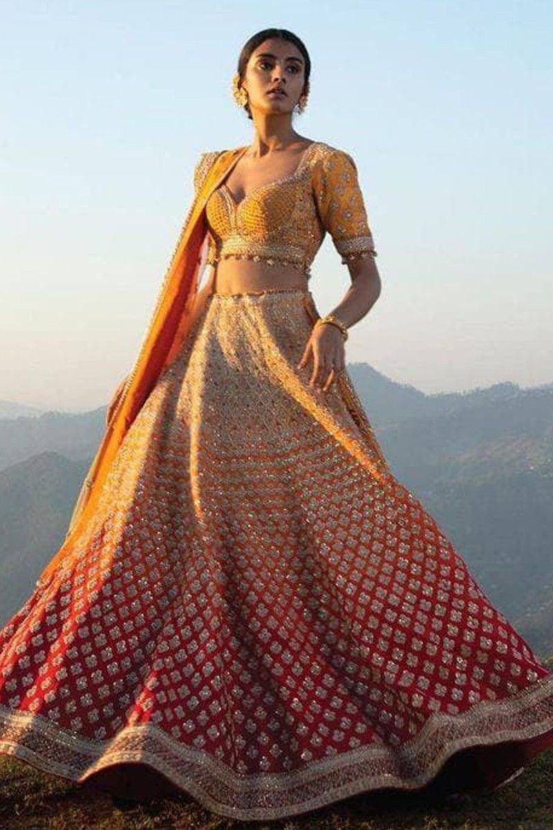 Multi Colored Embroidered Lehenga in Chinon with Mirror Work Blouse...