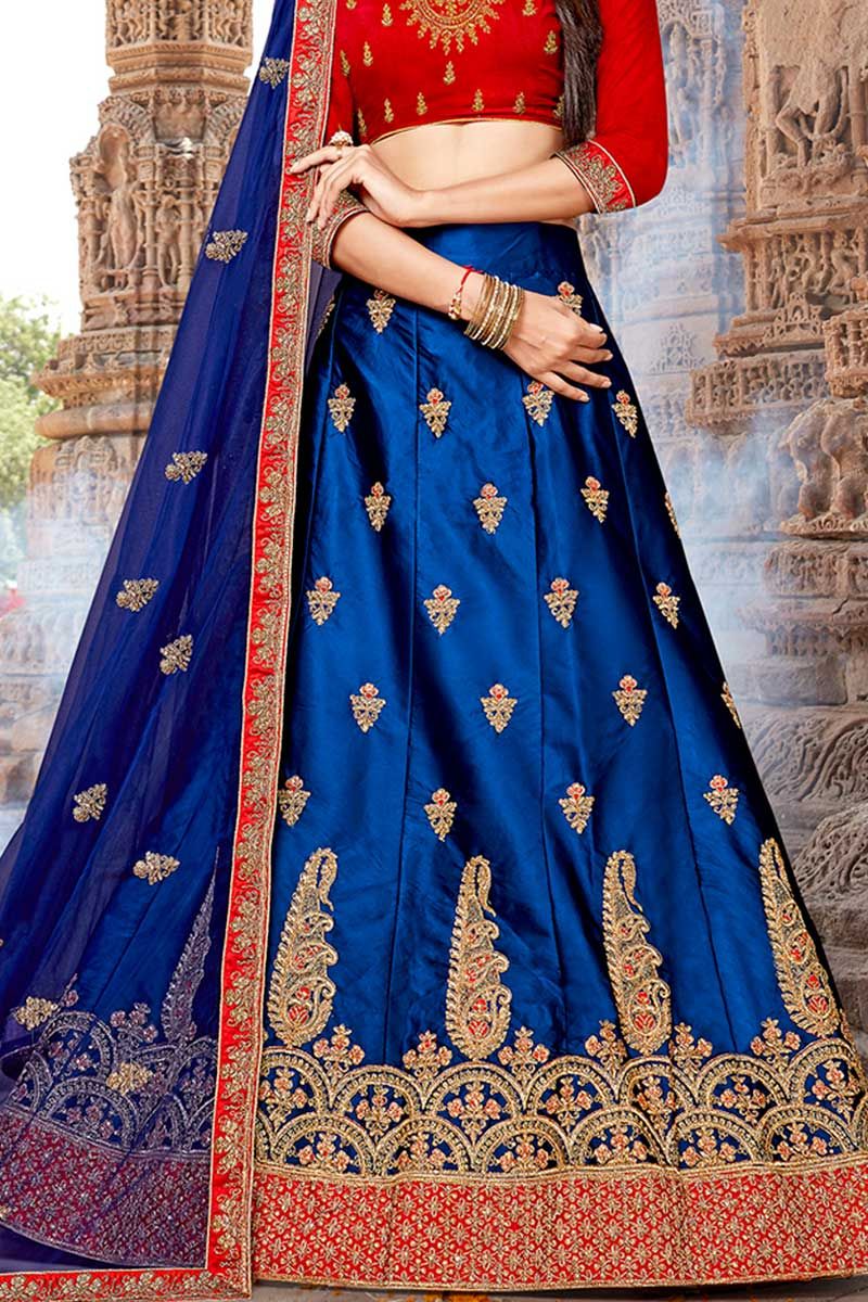 Photo of Royal blue and red lehenga for sangeet