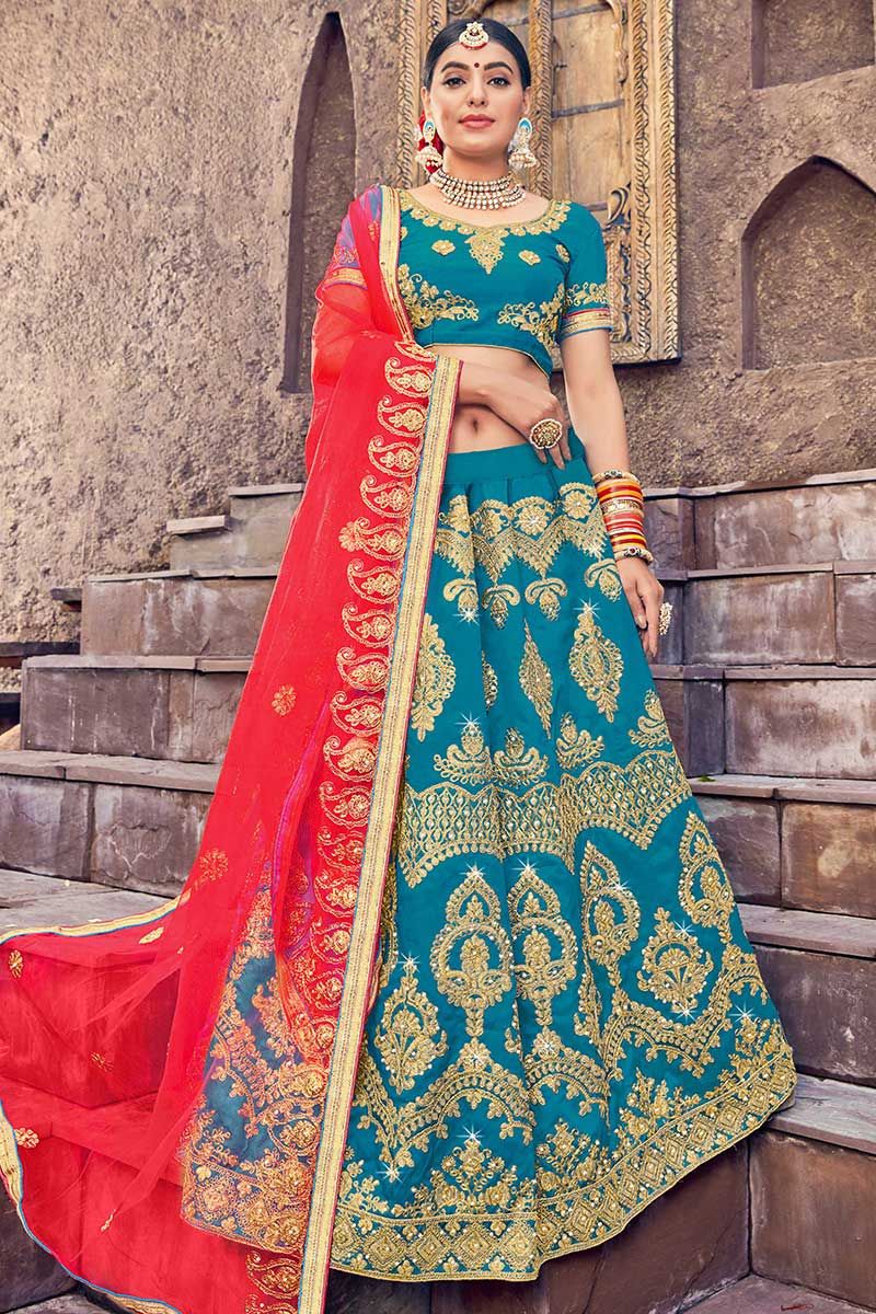 SKY BLUE LEHENGA SET WITH MULTI COLOURED EMBROIDERY AND 'ABLA' PAIRED WITH  A MATCHING DUPATTA, SILVER EMBELLISHMENTS AND TASSELS. - Seasons India